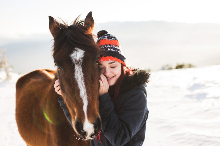 girl horse snow