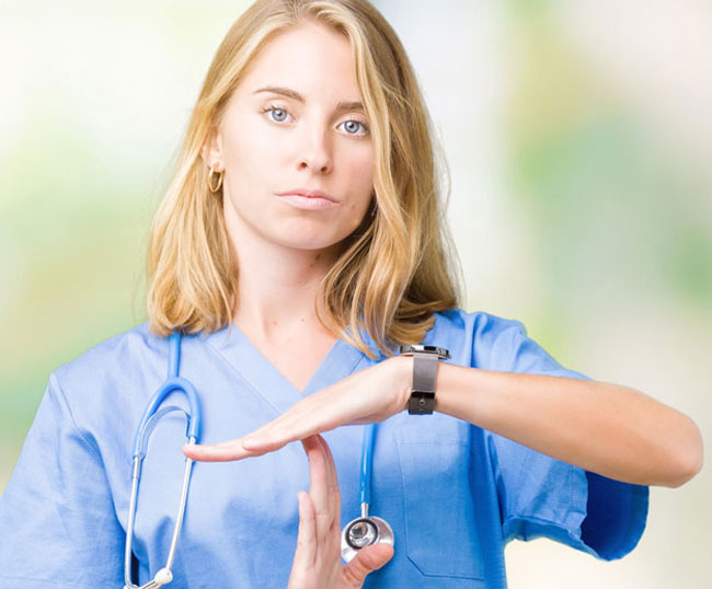 time-out-hand-gesture-woman-vet-iStock-Aaron-Amat-1068442580-650V