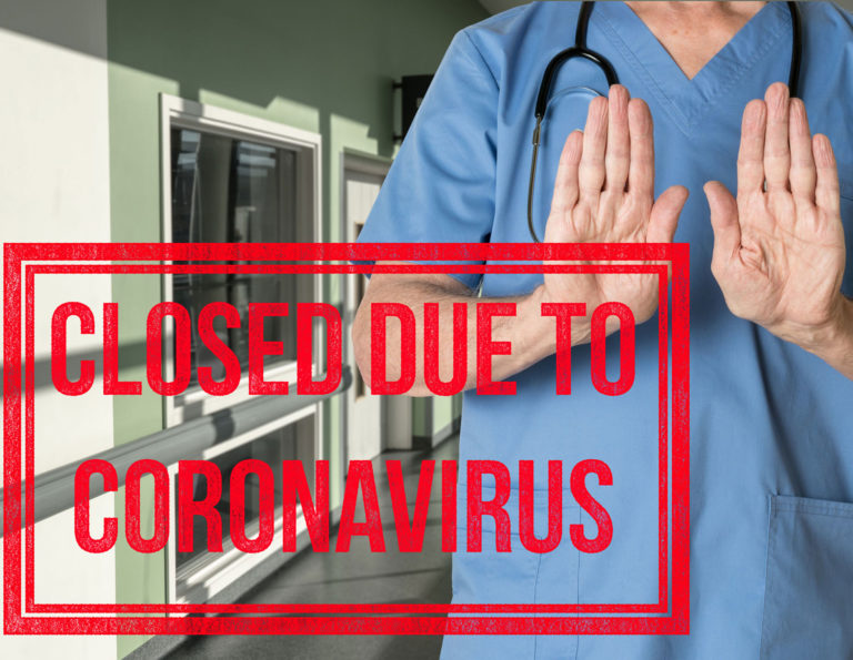 vet-closed-due-to-COVID-sign-hands-up-to-stop-iStock-Backyard-Production-1212839499-cropped-1900