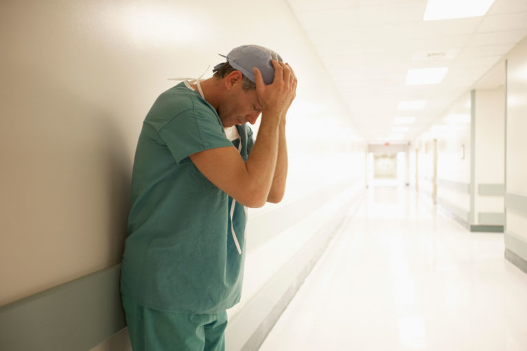 vet-stress-hall-head-in-hands-2400