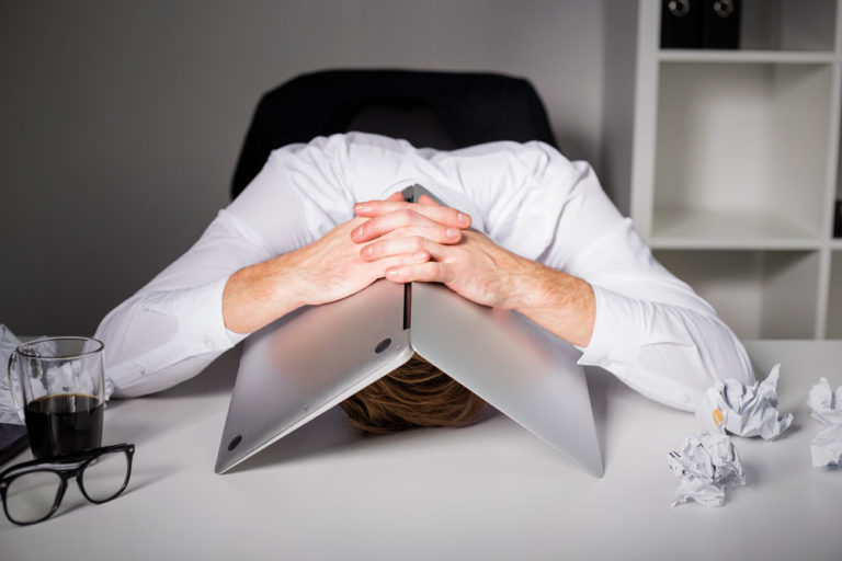 vet head under laptop