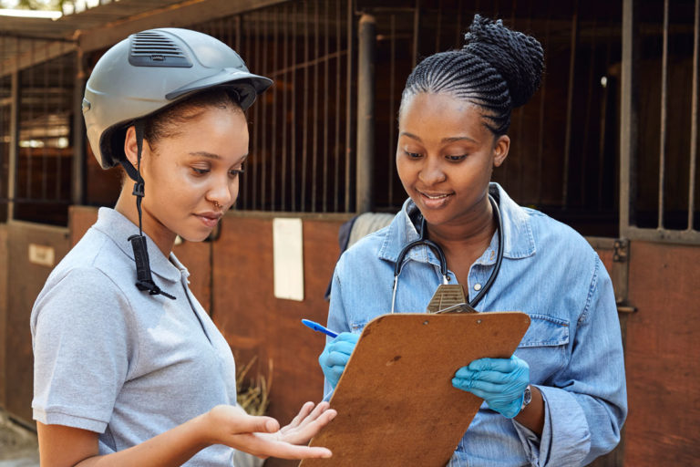 African-American veterinarian young black female rider