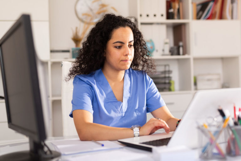 vet woman computer office