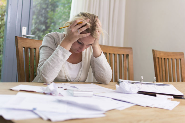 woman vet paperwork worries
