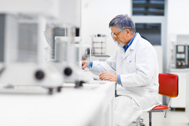 researcher in lab white coat