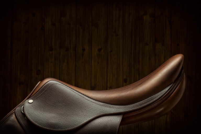 English Show Jumping Saddle in Tack Room - Side View