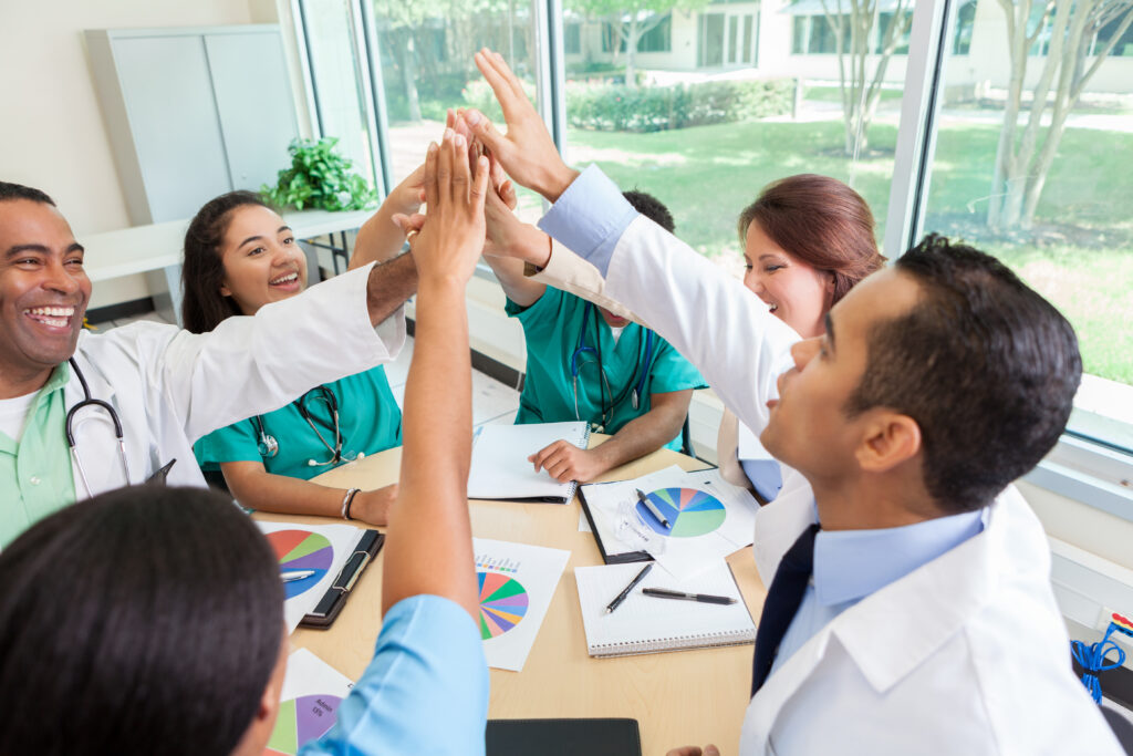 happy people in staff meeting