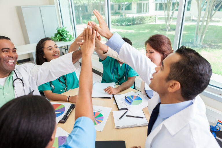 happy people in staff meeting