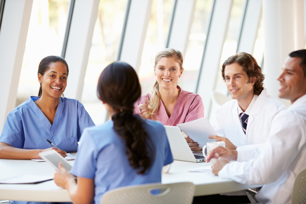 Equine veterinarians at a table creating a culture of civility and conquering incivility. 