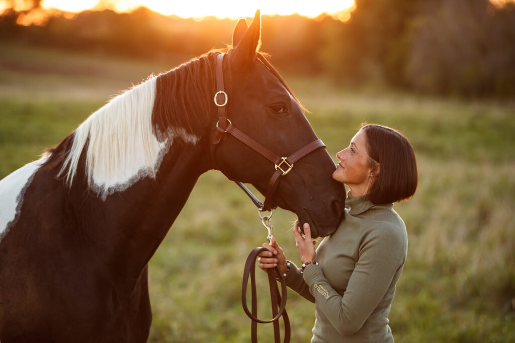 Female equine veterinarian representing DEI
