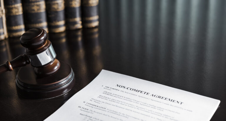 Non-Compete Clause with Gavel and Books